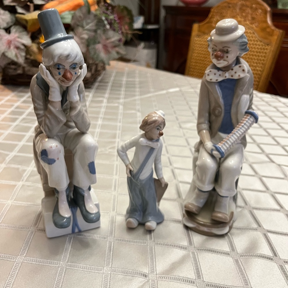 Three ceramic clowns made in Spain.